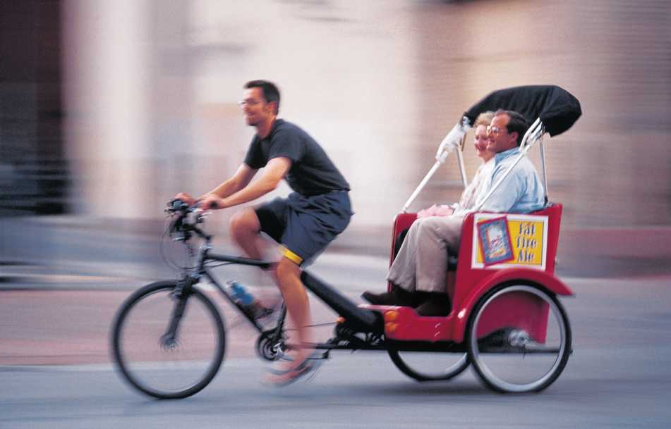 A pedicab downtown provides unique transportation for visitors.