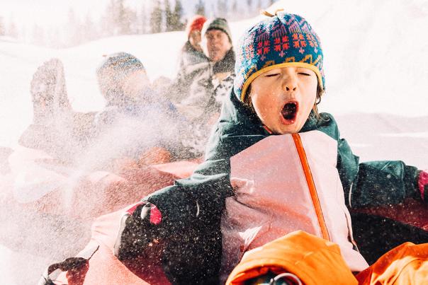 Family snow tubing at Winter Park Resort