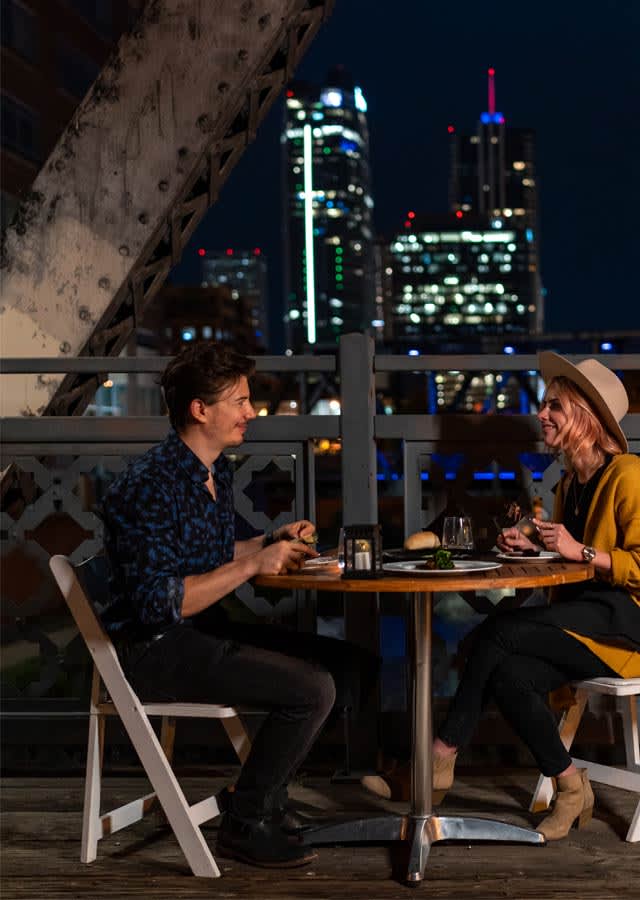 Couple dining outdoors at Coohills
