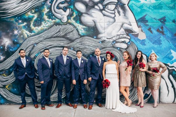 Wedding party in front of street art in Denver, Colorado