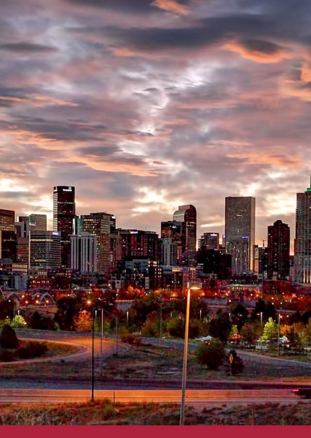 City Skyline with a sunrise backdrop in Denver, Colorado