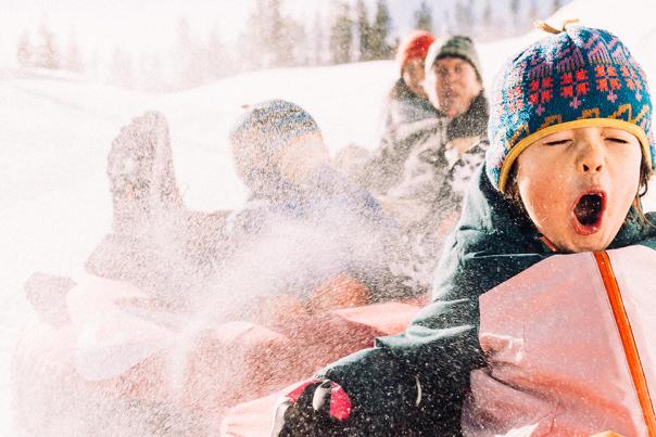 Family snow tubing at Winter Park Resort in Colorado